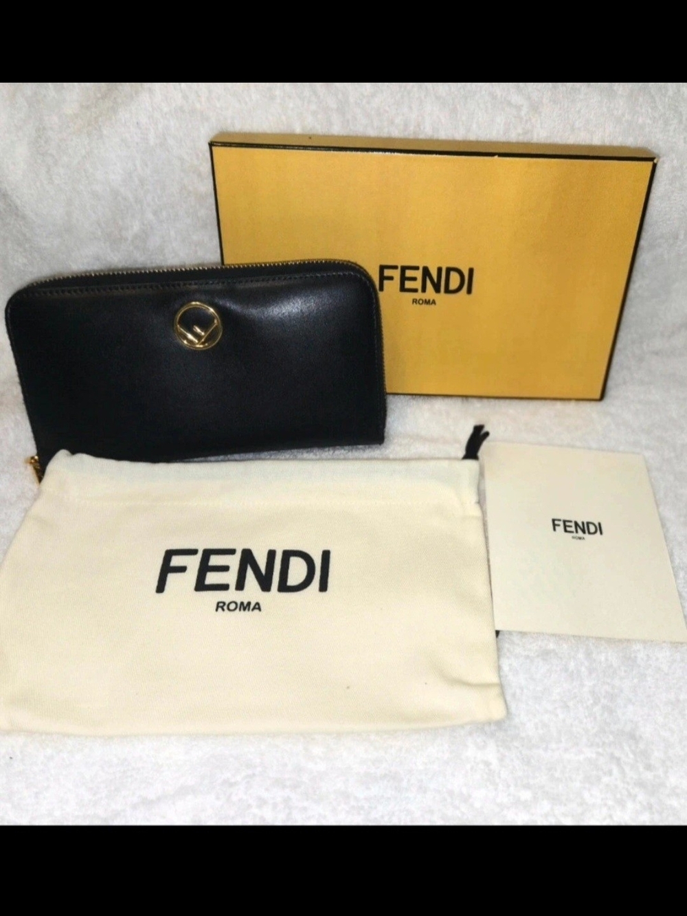 Authentic Fendi Black Leather Zip Wallet with Gold Accent